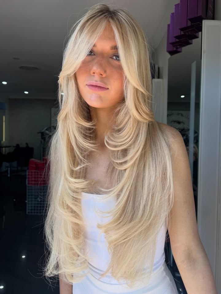 La Mode Hair and Beauty Hair Salon & Beauty Clinic, Gympie QLD Layers doing all the talking, by G Bright blonde layers through the mid-lengths and ends at La Mode Gympie