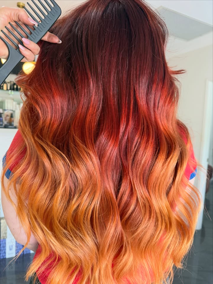 Blow-dried hair with shine and movement at La Mode Gympie