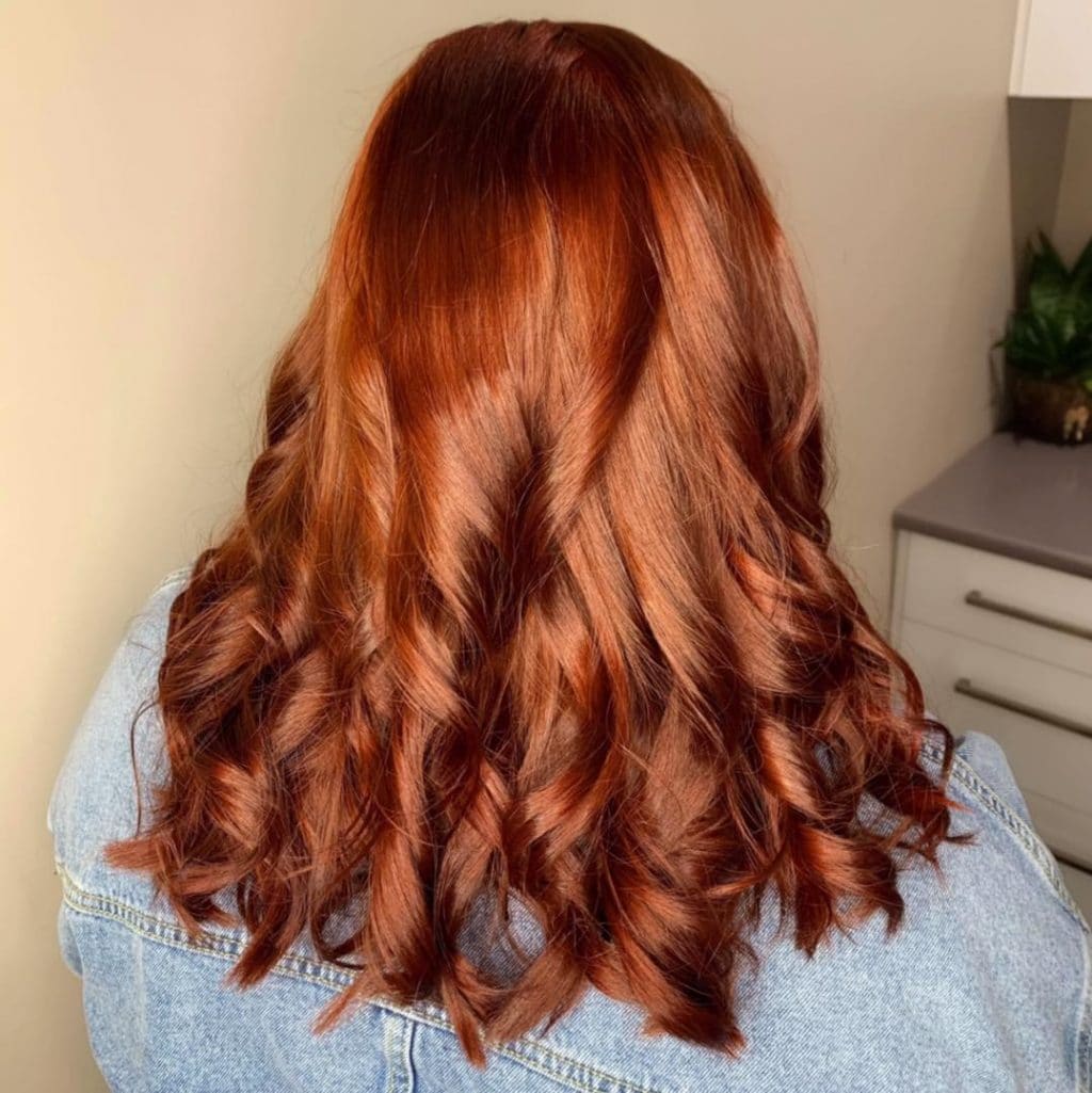 Copper red curls coloured at La Mode