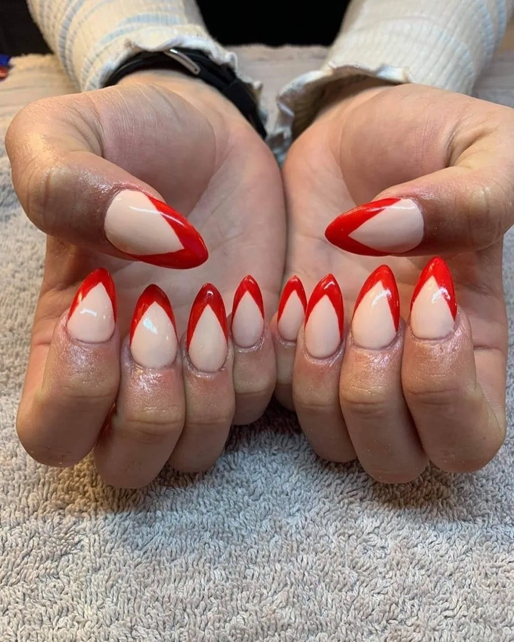 Red French tip stiletto nails by La Mode