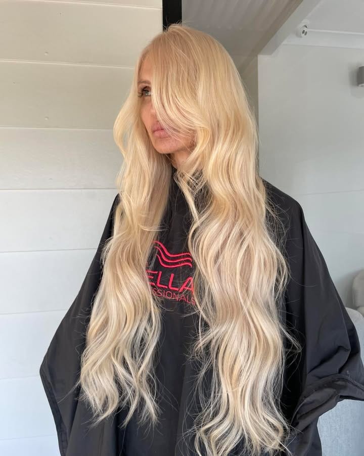 Long blonde hair with soft light through the ends at La Mode Gympie