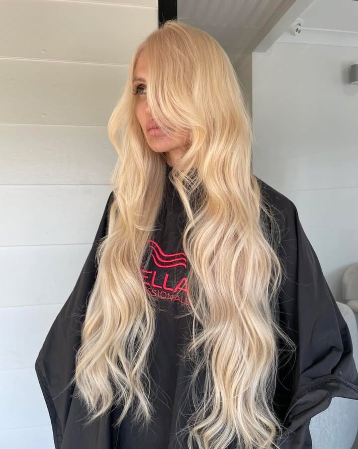 Close-up of blonde foils and toner on long hair at La Mode Gympie